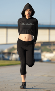 crop-top-hoodie-mockup-featuring-a-serious-woman-stretching-before-running-45224-r-el2