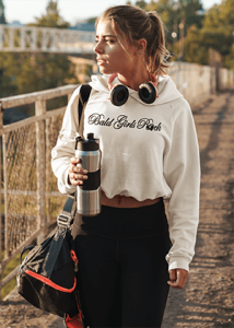 mockup-of-a-woman-wearing-a-crop-top-hoodie-while-walking-to-the-gym-46218-r-el2